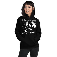 Load image into Gallery viewer, A woman wearing a black hoodie with a white silhouette of a murder of crows in it with the words, "I love a good Murder" stands with the hood up and her hands in the front pocket.