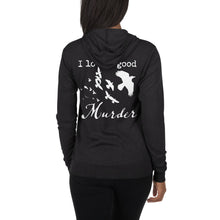 Load image into Gallery viewer, A woman is wearing a dark gray zip hoodie with white silhouettes of a murder of crows with the words, "I love a good Murder" on the back, facing away from the viewer.