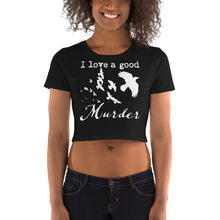 Load image into Gallery viewer, Woman wearing a black crop tee with a white graphic of crows in flight and the words, "I love a goos Murder" shown from the front.